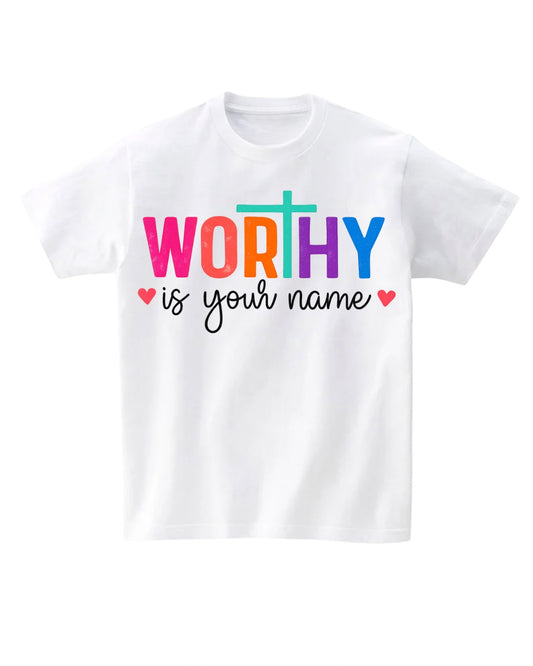 White t-shirt with colorful text 'WORTHY is your name' on a white background